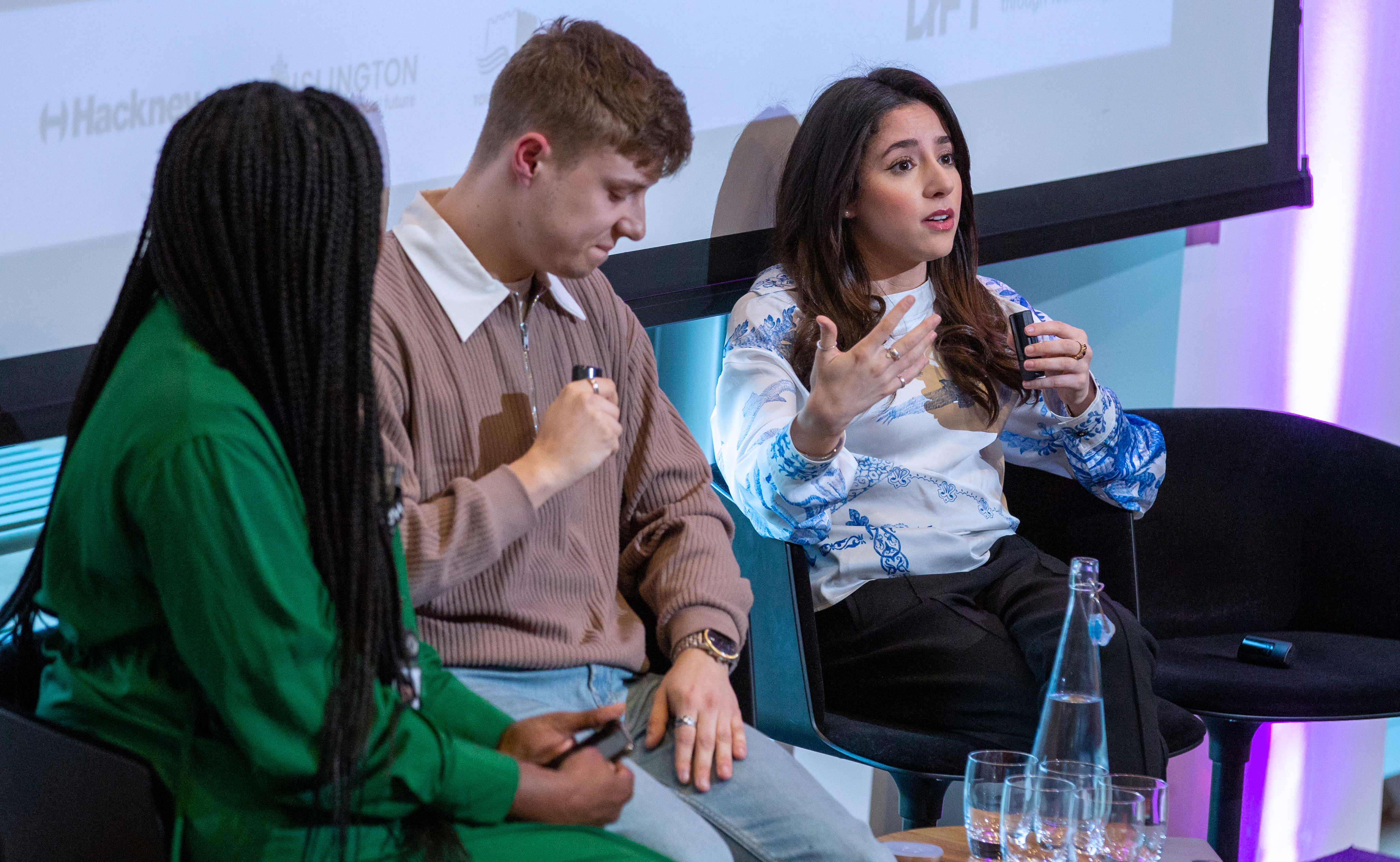 woman speaking on a panel
